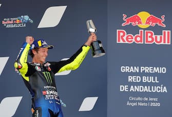 epa08566895 Italian MotoGP rider Valentino Rossi (Monster Energy Yamaha MotoGP) celebrates on the podium after getting the third position in the race in Jerez-Angel Nieto circuit in Jerez de la Frontera, Spain, 26 July 2020, during the Motorcycling Grand Prix of Andalusia.  EPA/ROMAN RIOS