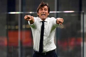 Inter Milan's Italian head coach Antonio Conte reacts during the Italian Serie A football match Inter Milan vs Napoli played behind closed doors at the San Siro Stadium in Milan, on July 28, 2020. (Photo by MARCO BERTORELLO / AFP) (Photo by MARCO BERTORELLO/AFP via Getty Images)