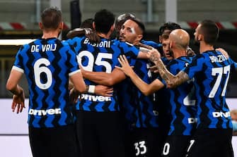 Inter Milan's Italian defender Danilo D'Ambrosio (C) celebrates with teammates after scoring during the Italian Serie A football match Inter Milan vs Napoli played behind closed doors at the San Siro Stadium in Milan, on July 28, 2020. (Photo by MARCO BERTORELLO / AFP) (Photo by MARCO BERTORELLO/AFP via Getty Images)