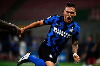 Inter Milan's Argentinian forward Lautaro Martinez celebrates after scoring during the Italian Serie A football match Inter Milan vs Napoli played behind closed doors at the San Siro Stadium in Milan on July 28, 2020. (Photo by MARCO BERTORELLO / AFP) (Photo by MARCO BERTORELLO/AFP via Getty Images)
