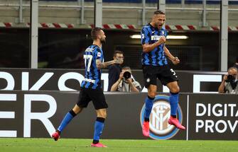 Inter Milan's Danilo D'Ambrosio (R) jubilates after scoring the 1-0 goal during the Italian Serie A soccer match Fc Inter vs Ssc Napoli at Giuseppe Meazza stadium in Milan, Italy, 28 July 2020.   ANSA / MATTEO BAZZI