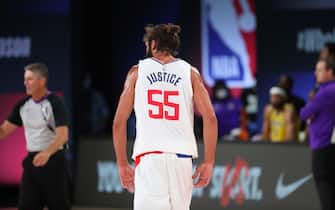 Orlando, FL - JULY 30: Joakim Noah #55 of the LA Clippers looks on during the game against the Los Angeles Lakers during a game on July 30, 2020 at The Arena at ESPN Wide World Of Sports Complex in Orlando, Florida. NOTE TO USER: User expressly acknowledges and agrees that, by downloading and/or using this Photograph, user is consenting to the terms and conditions of the Getty Images License Agreement. Mandatory Copyright Notice: Copyright 2020 NBAE (Photo by Joe Murphy/NBAE via Getty Images)