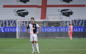 CAGLIARI, ITALY - JULY 29: Cristiano Ronaldo of Juventus looks dejcted after Cagliari score there 2nd goal during the Serie A match between Cagliari Calcio and  Juventus at Sardegna Arena on July 29, 2020 in Cagliari, Italy. (Photo by Emanuele Perrone/Getty Images)