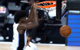 LAKE BUENA VISTA, FL - JULY 31: Jonathan Isaac #1 of the Orlando Magic dunks during the second half of an NBA basketball game against the Brooklyn Nets Friday, July 31, 2020, in Lake Buena Vista, Florida. NOTE TO USER: User expressly acknowledges and agrees that, by downloading and or using this photograph, User is consenting to the terms and conditions of the Getty Images License Agreement. (Photo by Ashley Landis-Pool/Getty Images)