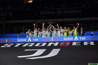 Juventus' players jubilate during the celebrations for the Juventus' victory of the 9th consecutive Italian championship (scudetto) at Allianz Stadium in Turin, Italy, 01 August 2020. ANSA/ALESSANDRO DI MARCO