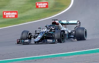 Mercedes' British driver Lewis Hamilton punctures near the finish of the Formula One British Grand Prix at the Silverstone motor racing circuit in Silverstone, central England on August 2, 2020. - Lewis Hamilton wins record seventh British Grand Prix . (Photo by ANDREW BOYERS / POOL / AFP) (Photo by ANDREW BOYERS/POOL/AFP via Getty Images)