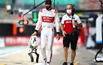 NORTHAMPTON, ENGLAND - AUGUST 01: Antonio Giovinazzi of Italy and Alfa Romeo Racing walks in the Pitlane during qualifying for the F1 Grand Prix of Great Britain at Silverstone on August 01, 2020 in Northampton, England. (Photo by Mark Thompson/Getty Images)