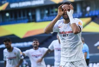 Sevilla's Moroccan forward Youssef En-Nesyri celebrates scoring during the UEFA Europa League round of 16 football match between Sevilla FC and AS Roma at the MSV Arena on August 6, 2020 in Duisburg. (Photo by WOLFGANG RATTAY / POOL / AFP) (Photo by WOLFGANG RATTAY/POOL/AFP via Getty Images)