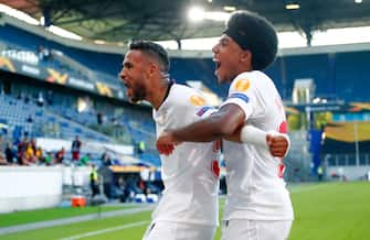 DUISBURG, GERMANY - AUGUST 06: Youssef En-Nesyri of Sevilla celebrates with Jules Kounde after he scores his sides second goal during the UEFA Europa League round of 16 single-leg match between Sevilla FC and AS Roma at MSV Arena on August 06, 2020 in Duisburg, Germany. (Photo by Wolfgang Rattay/Pool via Getty Images)