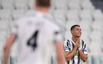 Juventus' Portuguese forward Cristiano Ronaldo reacts during the UEFA Champions League round of 16 second leg football match between Juventus and Olympique Lyonnais (OL), played behind closed doors due to the spread of the COVID-19 infection, caused by the novel coronavirus, at the Juventus stadium, in Turin , on August 7, 2020. (Photo by Miguel MEDINA / AFP) (Photo by MIGUEL MEDINA/AFP via Getty Images)