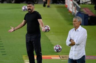 Napoli's Italian head coach Gennaro Gattuso reacts during the UEFA Champions League round of 16 second leg football match between FC Barcelona and Napoli at the Camp Nou stadium in Barcelona on August 8, 2020. (Photo by LLUIS GENE / AFP) (Photo by LLUIS GENE/AFP via Getty Images)