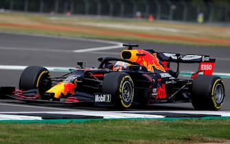Red Bull's Dutch driver Max Verstappen steers his car during the qualifying session of the F1 70th Anniversary Grand Prix at Silverstone on August 8, 2020 in Northampton. - This weekend's race will commemorate the 70th anniversary of the inaugural world championship race, held at Silverstone in 1950. (Photo by Frank Augstein / POOL / AFP) (Photo by FRANK AUGSTEIN/POOL/AFP via Getty Images)
