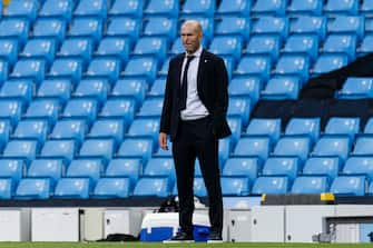 MANCHESTER, ENGLAND - AUGUST 07: Zinedine Zidane Head Coach of Real Madrid during the UEFA Champions League round of 16 second leg match between Manchester City and Real Madrid at Etihad Stadium on August 7, 2020 in Manchester, United Kingdom. (Photo by Ricardo Nogueira/Eurasia Sport Images/Getty Images)