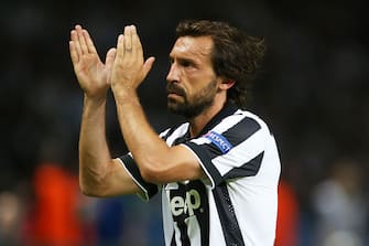 BERLIN, GERMANY - JUNE 06:  Juventus Andrea Pirlo claps the fans during the UEFA Champions League Final between Barcelona and Juventus at Olympiastadion on June 6, 2015 in Berlin, Germany. (Photo by Ian MacNicol/Getty Images)
