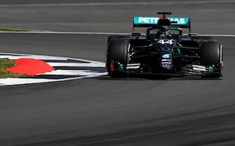 NORTHAMPTON, ENGLAND - AUGUST 09: Lewis Hamilton of Great Britain driving the (44) Mercedes AMG Petronas F1 Team Mercedes W11 on track during the F1 70th Anniversary Grand Prix at Silverstone on August 09, 2020 in Northampton, England. (Photo by Rudy Carezzevoli/Getty Images)