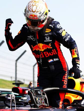 NORTHAMPTON, ENGLAND - AUGUST 09: Race winner Max Verstappen of Netherlands and Red Bull Racing celebrates in parc ferme during the F1 70th Anniversary Grand Prix at Silverstone on August 09, 2020 in Northampton, England. (Photo by Bryn Lennon/Getty Images)