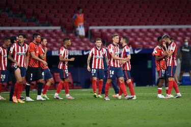 MADRID, SPAIN - JULY 19: Players of Atletico react after the Liga match between Club Atletico de Madrid and Real Sociedad at Wanda Metropolitano on July 19, 2020 in Madrid, Spain. (Photo by Denis Doyle/Getty Images)