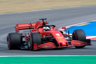 Ferrari's German driver Sebastian Vettel steers his car during the qualifying session at the Circuit de Catalunya in Montmelo near Barcelona on August 15, 2020 ahead of the Spanish F1 Grand Prix. (Photo by Josep LAGO / POOL / AFP) (Photo by JOSEP LAGO/POOL/AFP via Getty Images)