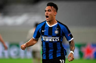 Inter Milan's Argentinian forward Lautaro Martinez celebrates scoring the opening goal during the UEFA Europa League semi-final football match Inter Milan v Shakhtar Donetsk on August 17, 2020 in Duesseldorf, western Germany. (Photo by Sascha Steinbach / POOL / AFP) (Photo by SASCHA STEINBACH/POOL/AFP via Getty Images)
