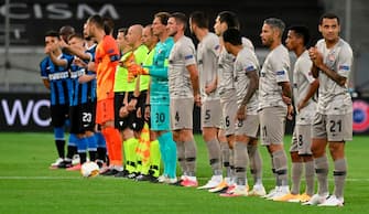 Players line up prior to the UEFA Europa League semi-final football match Inter Milan v Shakhtar Donetsk on August 17, 2020 in Duesseldorf, western Germany. (Photo by Sascha Steinbach / POOL / AFP) (Photo by SASCHA STEINBACH/POOL/AFP via Getty Images)