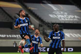 Inter Milan's Italian defender Danilo D'Ambrosio  (L) celebrates scoring the 2-0 with his team-mates during the UEFA Europa League semi-final football match Inter Milan v Shakhtar Donetsk on August 17, 2020 in Duesseldorf, western Germany. (Photo by Lars Baron / POOL / AFP) (Photo by LARS BARON/POOL/AFP via Getty Images)