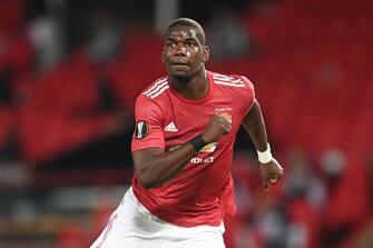 MANCHESTER, ENGLAND - AUGUST 05: Paul Pogba of Manchester United in action during the UEFA Europa League round of 16 second leg match between Manchester United and LASK at Old Trafford on August 05, 2020 in Manchester, England. (Photo by Michael Regan/Getty Images)