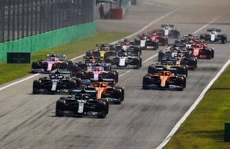 MONZA, ITALY - SEPTEMBER 06: Lewis Hamilton of Great Britain driving the (44) Mercedes AMG Petronas F1 Team Mercedes W11 leads the field at the start of the race during the F1 Grand Prix of Italy at Autodromo di Monza on September 06, 2020 in Monza, Italy. (Photo by Mark Thompson/Getty Images)