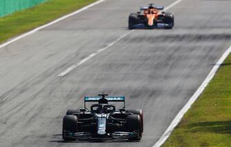 MONZA, ITALY - SEPTEMBER 06: Lewis Hamilton of Great Britain driving the (44) Mercedes AMG Petronas F1 Team Mercedes W11 leads Carlos Sainz of Spain driving the (55) McLaren F1 Team MCL35 Renault during the F1 Grand Prix of Italy at Autodromo di Monza on September 06, 2020 in Monza, Italy. (Photo by Mark Thompson/Getty Images)