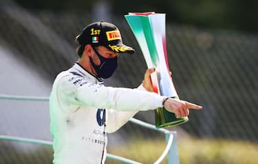 MONZA, ITALY - SEPTEMBER 06: Race winner Pierre Gasly of France and Scuderia AlphaTauri celebrates on the podium during the F1 Grand Prix of Italy at Autodromo di Monza on September 06, 2020 in Monza, Italy. (Photo by Mark Thompson/Getty Images)
