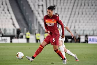 TURIN, ITALY - AUGUST 1: Chris Smalling of AS Roma  during the Italian Serie A   match between Juventus v AS Roma at the Allianz Stadium on August 1, 2020 in Turin Italy (Photo by Mattia Ozbot/Soccrates/Getty Images)
