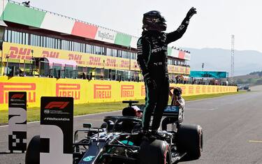 SCARPERIA, ITALY - SEPTEMBER 12: Pole position qualifier Lewis Hamilton of Great Britain and Mercedes GP celebrates in parc ferme during qualifying for the F1 Grand Prix of Tuscany at Mugello Circuit on September 12, 2020 in Scarperia, Italy. (Photo by Luca Bruno - Pool/Getty Images)