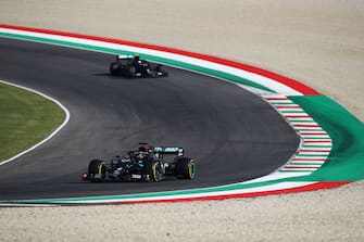 SCARPERIA, ITALY - SEPTEMBER 13: Lewis Hamilton of Great Britain driving the (44) Mercedes AMG Petronas F1 Team Mercedes W11 leads Valtteri Bottas of Finland driving the (77) Mercedes AMG Petronas F1 Team Mercedes W11 during the F1 Grand Prix of Tuscany at Mugello Circuit on September 13, 2020 in Scarperia, Italy. (Photo by Bryn Lennon/Getty Images)