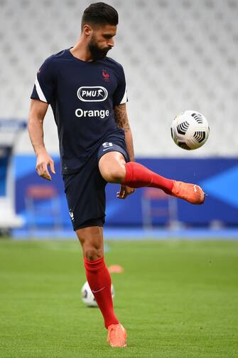 1228406430 France's forward Olivier Giroud warms up before the UEFA Nations League Group 3 qualifying football match between France and Croatia at the Stade de France, in Saint-Denis, on September 8, 2020. (Photo by FRANCK FIFE / AFP) (Photo by FRANCK FIFE/AFP via Getty Images)