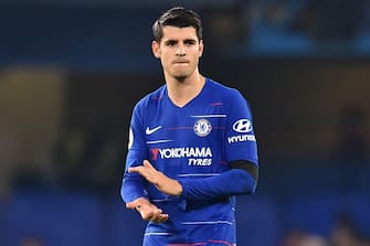 Chelsea's Spanish striker Alvaro Morata applauds supporters on the pitch after the English Premier League football match between Chelsea and Crystal Palace at Stamford Bridge in London on November 4, 2018. - Chelsea won the game 3-1. (Photo by Glyn KIRK / AFP) / RESTRICTED TO EDITORIAL USE. No use with unauthorized audio, video, data, fixture lists, club/league logos or 'live' services. Online in-match use limited to 120 images. An additional 40 images may be used in extra time. No video emulation. Social media in-match use limited to 120 images. An additional 40 images may be used in extra time. No use in betting publications, games or single club/league/player publications. /         (Photo credit should read GLYN KIRK/AFP via Getty Images)