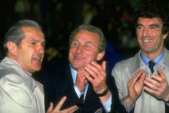 16 May1984:  Giovanni Trapattoni (centre) and Dino Zoff (right), the Juventus management team, celebrate after their victory in the European Cup Winners Cup final against Porto at the St. Jakob Stadium in Basle, Switzerland. Juventus won the match 2-1. \Mandatory Credit: David  Cannon/Allsport