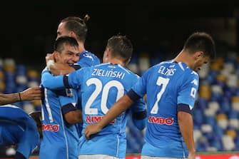 Napoli's forward Hirving Lozano jubilates with his teammate after scoring the goal  5-0 during Italian Serie A soccer  match between SSc Napoli and Genoa CFC at the San Paolo stadium in Naples,  27 September 2020. ANSA / CESARE ABBATE