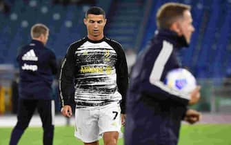 Juventus' Portuguese forward Cristiano Ronaldo warms up prior to the Italian Serie A football match Roma vs Juventus on September 27, 2020 at the Olympic stadium in Rome. (Photo by Tiziana FABI / AFP) (Photo by TIZIANA FABI/AFP via Getty Images)