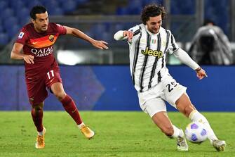 Juventus' French midfielder Adrien Rabiot (R) challenges Roma's Spanish forward Pedro during the Italian Serie A football match Roma vs Juventus on September 27, 2020 at the Olympic stadium in Rome. (Photo by Tiziana FABI / AFP) (Photo by TIZIANA FABI/AFP via Getty Images)