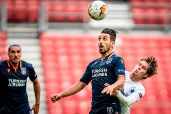Istanbul Basaksehir's Irfan Can Kahveci and FC Copenhagen's Robert Mudrazija vie for the ball during the UEFA Europa League round of 16 football match between FC Copenhagen and Istanbul Basaksehir on August 5, 2020 in Telia Parken in Copenhagen. (Photo by Mads Claus Rasmussen / Ritzau Scanpix / AFP) / Denmark OUT (Photo by MADS CLAUS RASMUSSEN/Ritzau Scanpix/AFP via Getty Images)