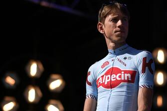 Russia's rider Ilnur Zakarin of Switzerland's Team Katusha Alpecin poses on stage during the team presentation ceremony at the Grand-Place - Grote Markt Square in Brussels on July 4, 2019, two days prior to the start of the 106th edition of the Tour de France cycling race. - On Saturday, July 6, the 106th edition of the Tour de France will start with a 194.5km stage in the region of Brussels, 100 years after the introduction of the yellow jersey and 50 years after Belgian legend Eddy Merckx won his first Tour. (Photo by Marco Bertorello / AFP)        (Photo credit should read MARCO BERTORELLO/AFP via Getty Images)
