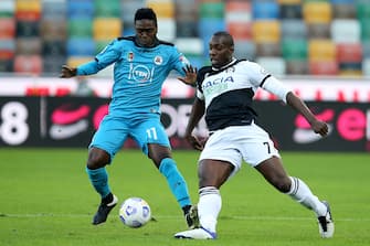 Udinese's Stefano Okaka (R) and Spezia s Emmanuel Gyasi in action during the Italian Serie A soccer match Udinese Calcio vs Spezia ASC at the Friuli - Dacia Arena stadium in Udine, Italy, 30 September 2020. ANSA/GABRIELE MENIS