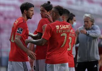 LISBON, PORTUGAL - SEPTEMBER 26:  Ruben Dias of SL Benfica celebrates with teammates after scoring a goal during the Liga NOS match between SL Benfica and Moreirense FC at Estadio da Luz on September 26, 2020 in Lisbon, Portugal.  (Photo by Gualter Fatia/Getty Images)