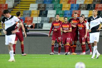 Roma's Rodriguez Pedro (C) celebrated by his teammates after scoring the goal during the Italian Serie A soccer match Udinese Calcio vs AS Roma at the Friuli - Dacia Arena stadium in Udine, Italy, 3 October 2020. ANSA/GABRIELE MENIS