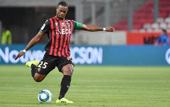 Nice's French midfielder Wylan Cyprien shoot during the French L1 football match Nice (OGCN) vs Dijon (FCO) on September 21, 2019 at "Allianz Riviera" stadium in Nice, southern France. (Photo by YANN COATSALIOU / AFP)        (Photo credit should read YANN COATSALIOU/AFP via Getty Images)