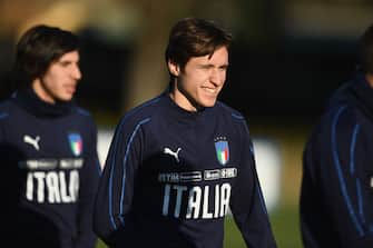 FLORENCE, ITALY - FEBRUARY 04:  Federico Chiesa of Italy smiles during a training session at Centro Tecnico Federale di Coverciano on February 4, 2019 in Florence, Italy.  (Photo by Claudio Villa/Getty Images)