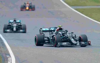Mercedes' Finnish driver Valtteri Bottas races aheaf of Mercedes' British driver Lewis Hamilton during the German Formula One Eifel Grand Prix at the Nuerburgring circuit in Nuerburg, western Germany, on October 11, 2020. (Photo by RONALD WITTEK / POOL / AFP) (Photo by RONALD WITTEK/POOL/AFP via Getty Images)