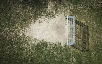 1224777937 COLOGNE, GERMANY - APRIL 1: (EDITOR'S NOTE: Photo taken with a drone.) This aerial view shows the amateur soccer field Bolzplatz playground Kyllstrasse/Siegstrasse in district Rodenkirchen on April 1, 2020 in Cologne, Germany. (Photo by Mika Volkmann/Getty Images)