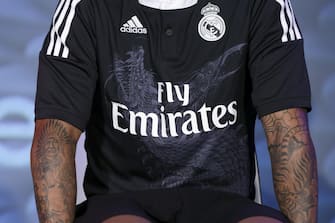 A close-up view of the dragon featured on the jersey of Real Madrid's Brazilian player Marcelo during the presentation of the team's new outfit for the UEFA Champions League at the Santiago Bernabeu stadium in Madrid, Spain, 26 August 2014. The new outfit was designed by Japanese Yohji Yamamoto for Adidas. EFE/Juan Carlos Hidalgo 