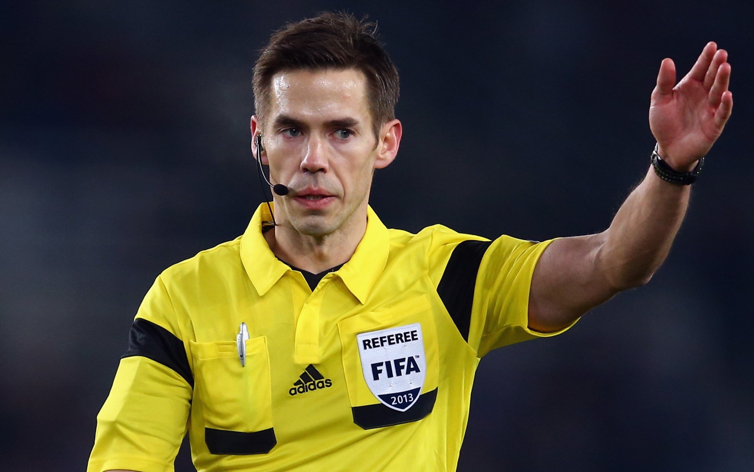 454928699 SAN SEBASTIAN, SPAIN - DECEMBER 10: Referee Tom Harald Hagen gestures during the UEFA Champions League Group A match between Real Sociedad de Futbol and Bayer Leverkusen at Estadio Anoeta on December 10, 2013 in San Sebastian, Spain. (Photo by Alex Grimm/Bongarts/Getty Images)