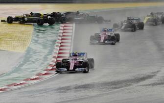 epa08821312 Canadian Formula One driver Lance Stroll of BWT Racing Point (front) leads the pack of cars during the 2020 Formula One Grand of Turkey at the Intercity Istanbul Park circuit, Istanbul, Turkey, 15 November 2020.  EPA/Murad Sezer / Pool